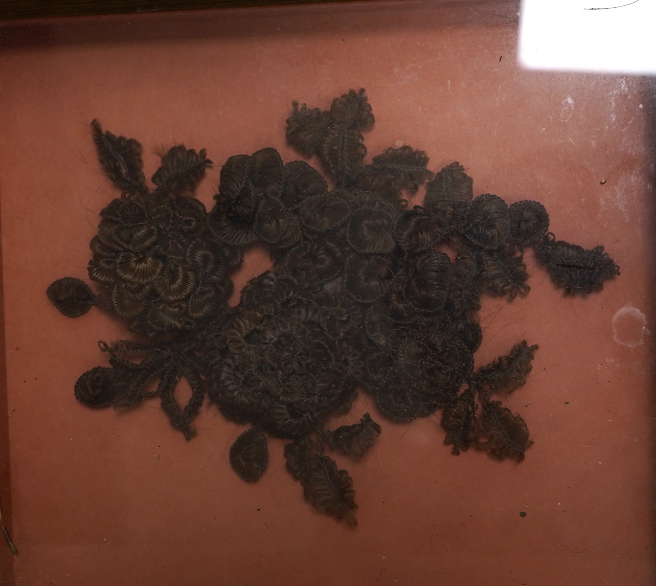 A group of beadwork floral appliqués, necklaces and an evening bag